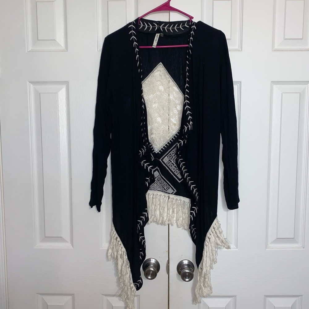 Black cardigan with lace detail and fringe